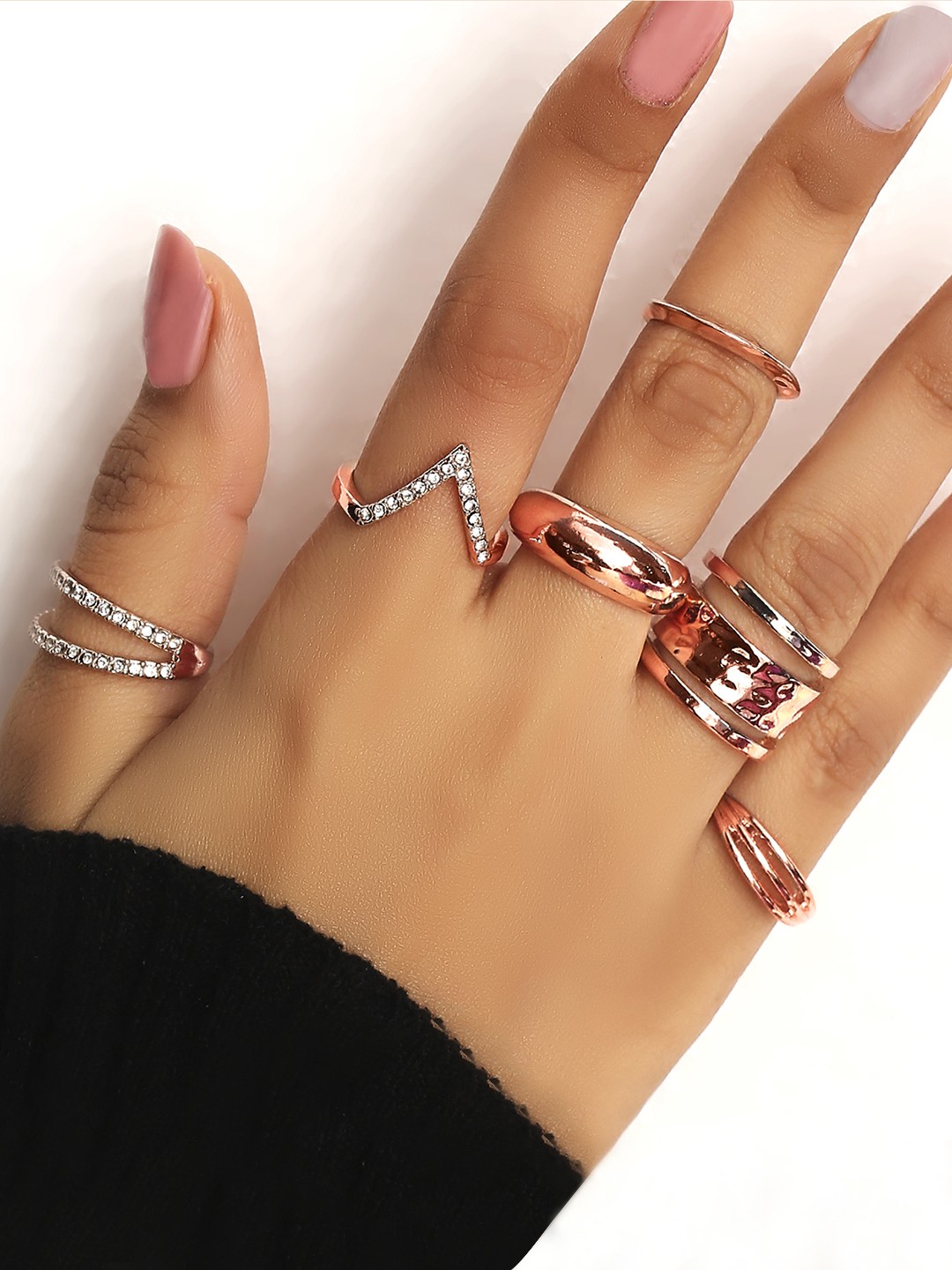 Set of 6 rose gold rings with stones