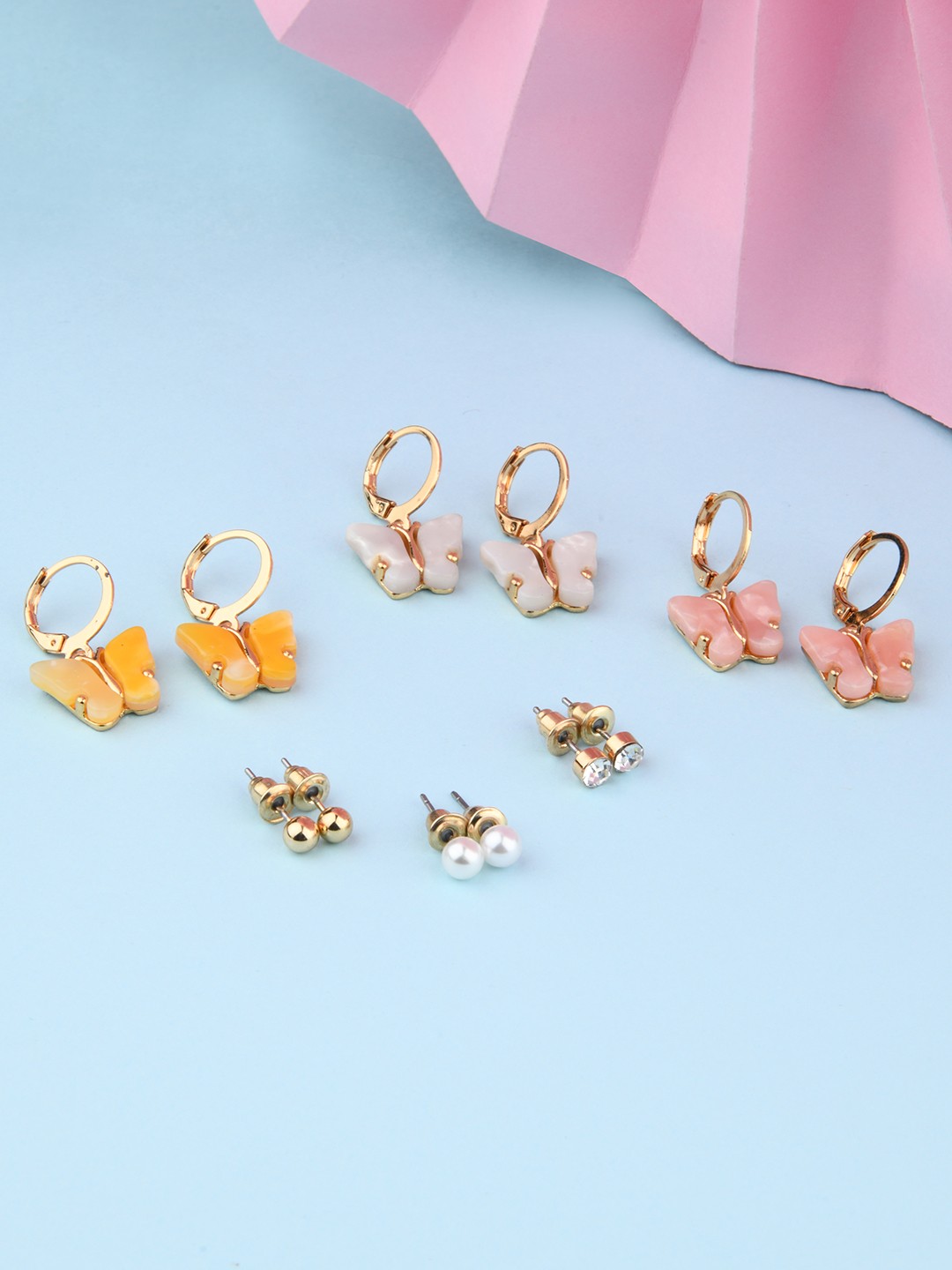 Set of 6 Gold toned 3 butterfly hoops and 3 stud earrings