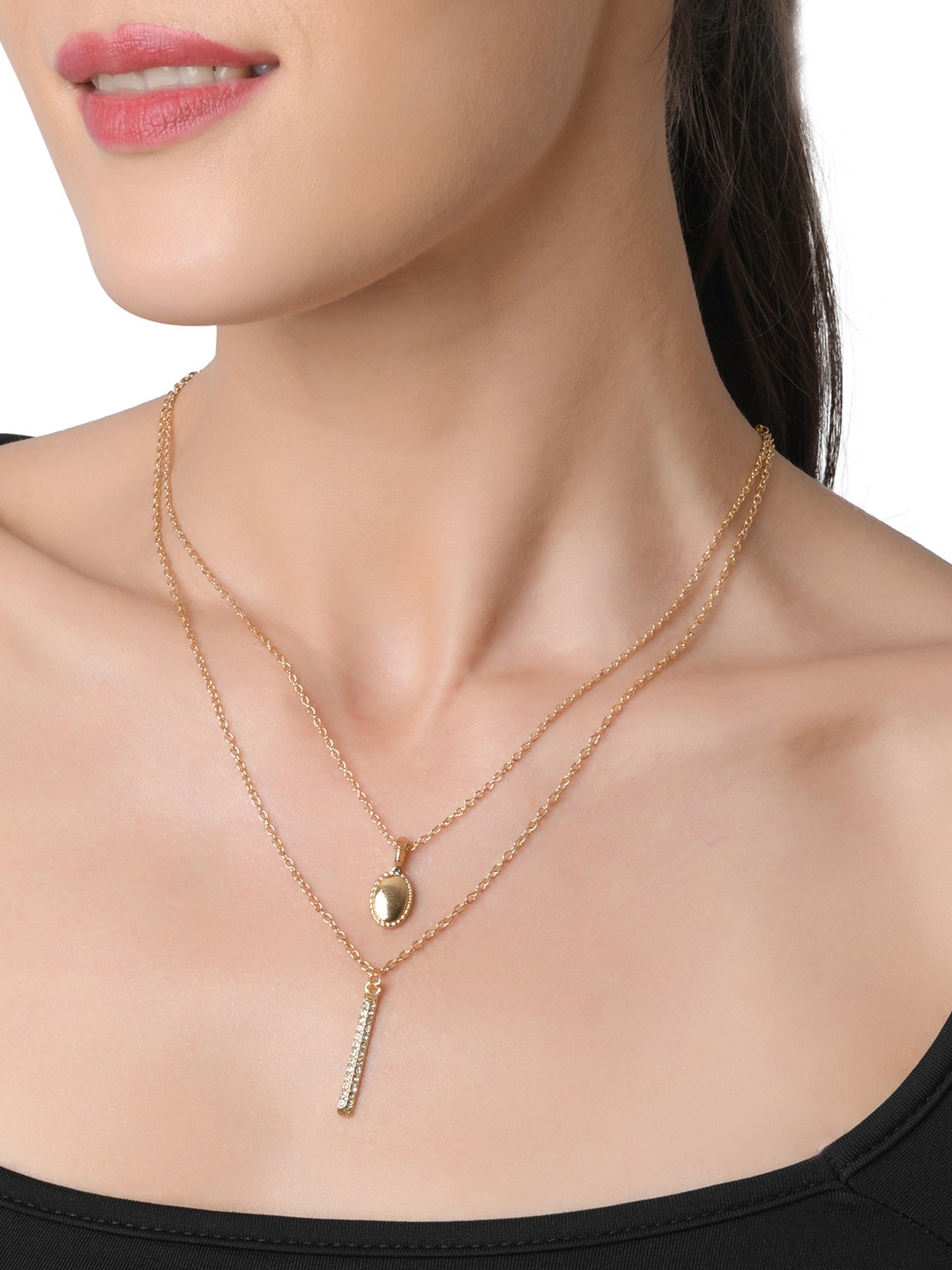 Gold toned two layered necklace with oval and crystal studed bar charm