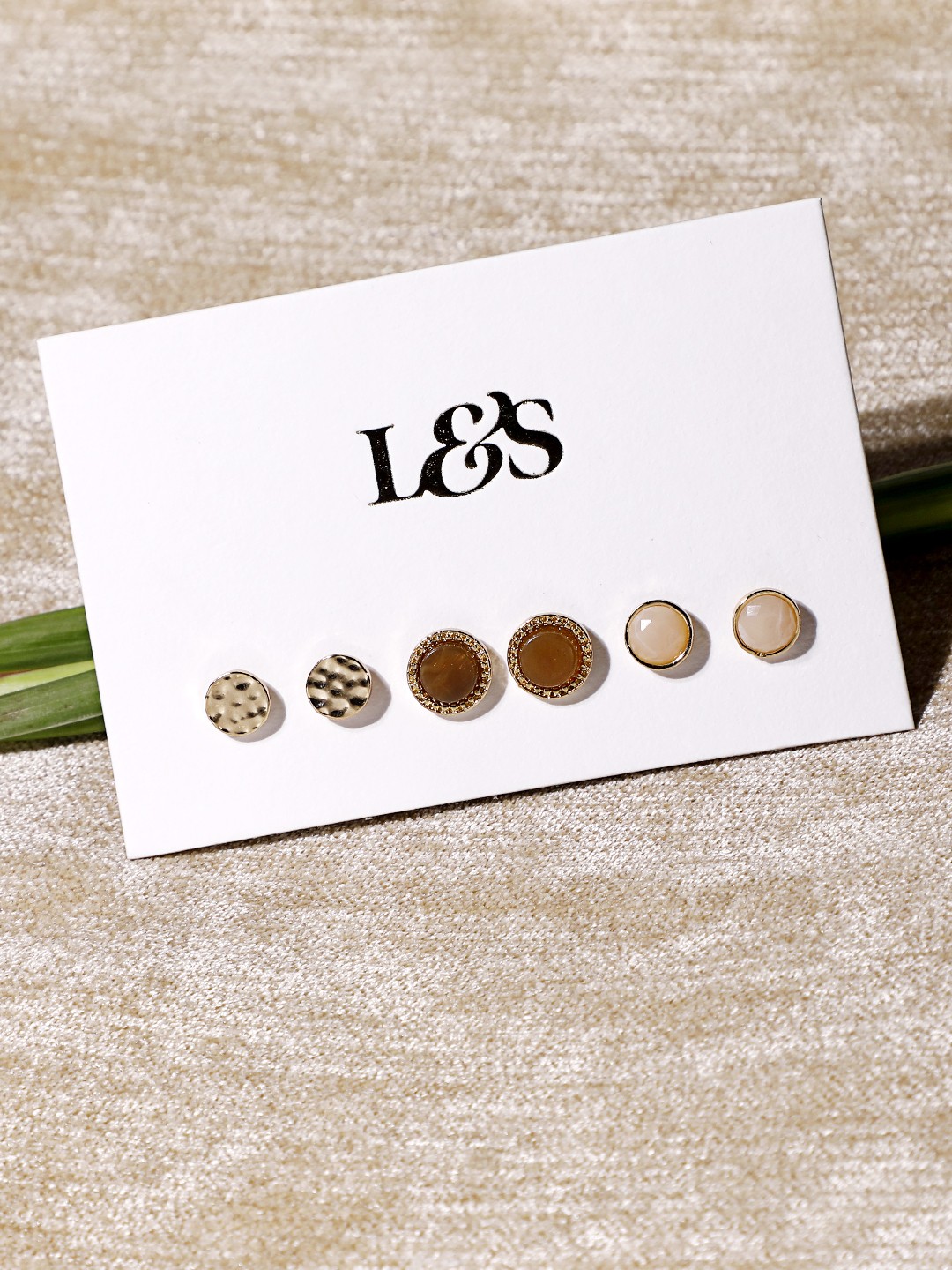Gold toned set of 3 stud earrings