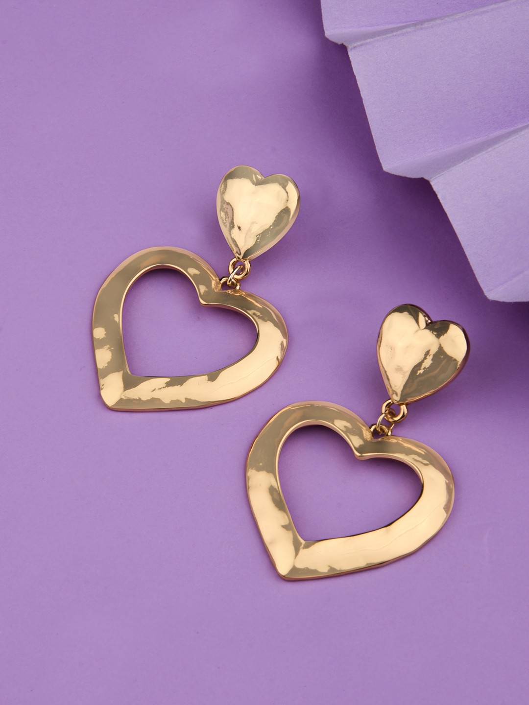 Gold toned hammered heart shaped drop earrings
