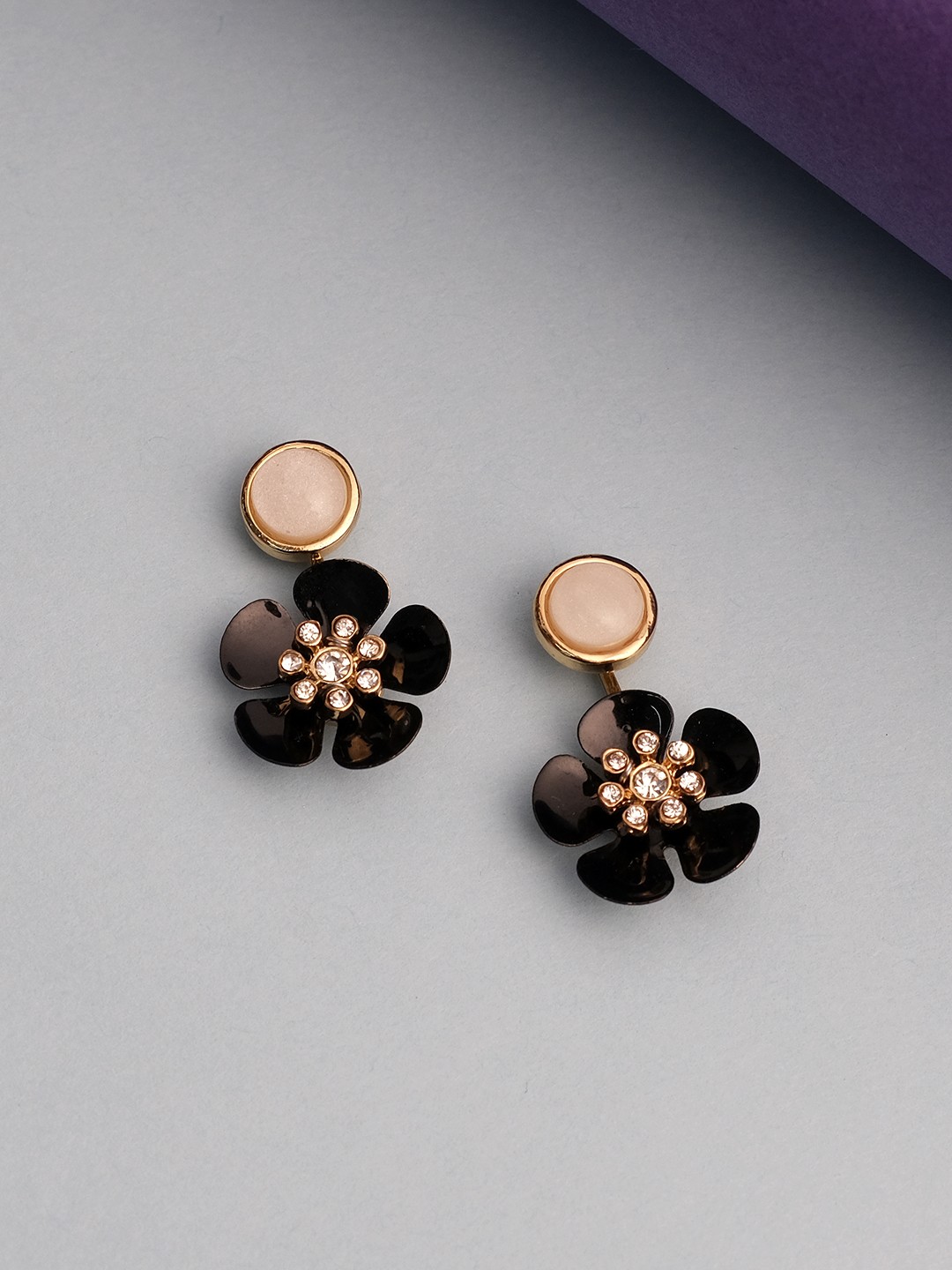 Gold toned black flower front and back earrings