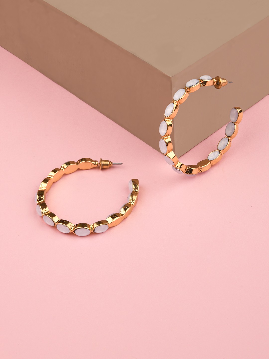 Gold toned stone embellished hoop earrings