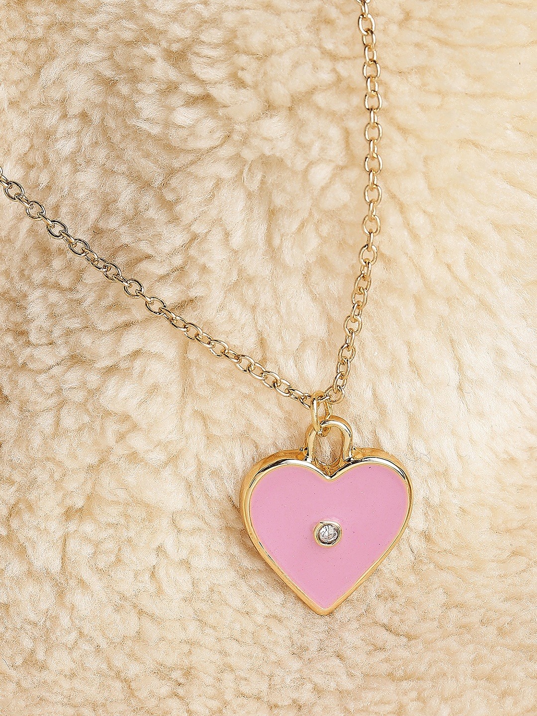 Gold toned chain with pink enameled heart charm
