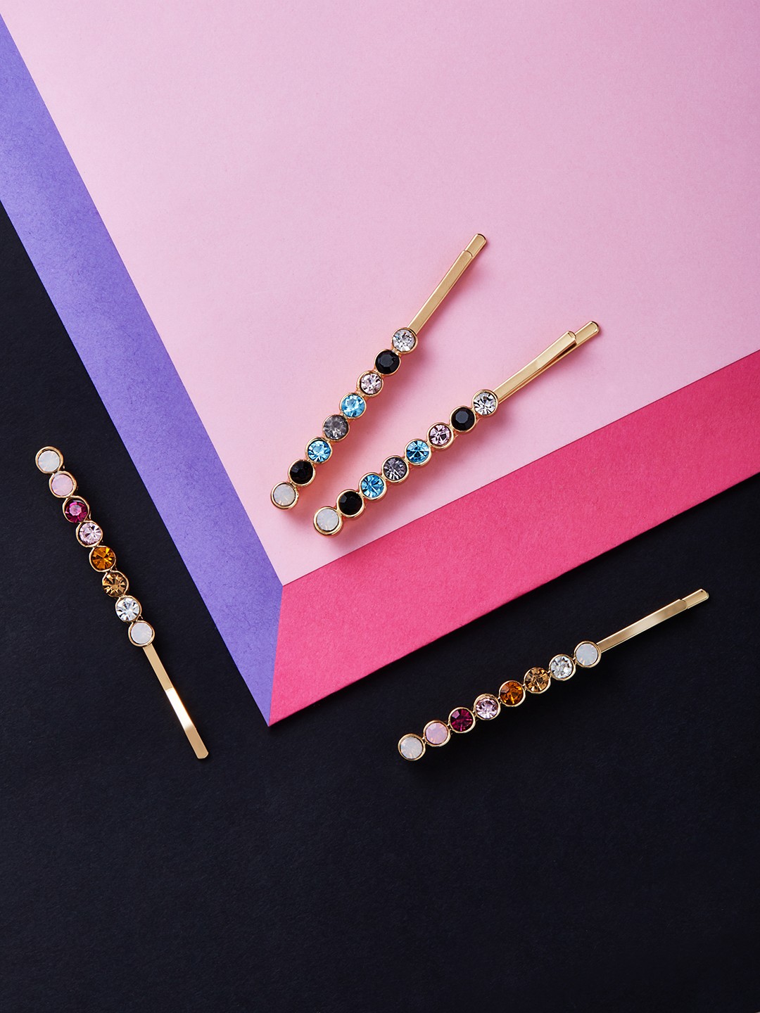 Gold toned set of 4 multi stone bobby pins