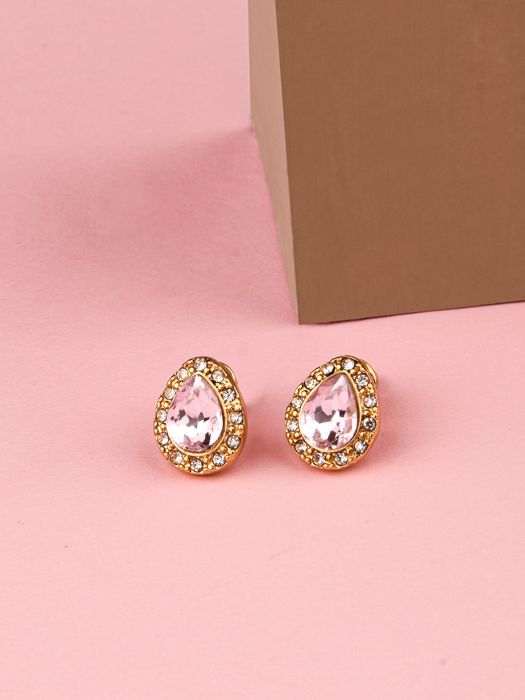 Gold toned drop shaped Stud Earrings with Pink stone