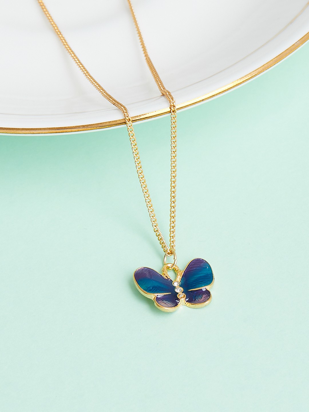 Gold toned chain with enameled butterfly charm