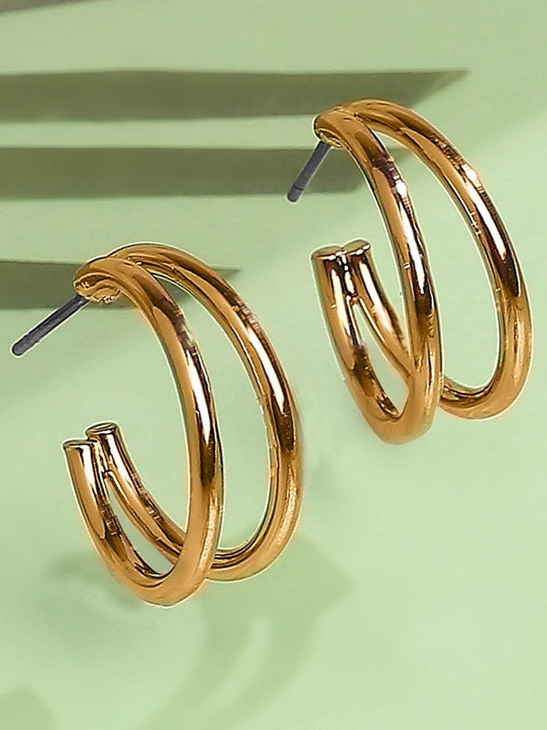Gold toned double half hoop earrings
