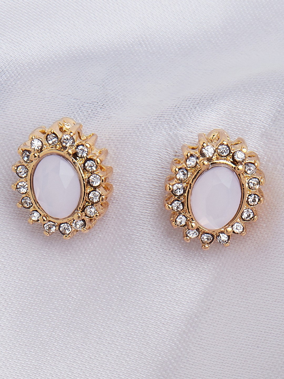 Gold toned pink stoned and crystal stud earrings