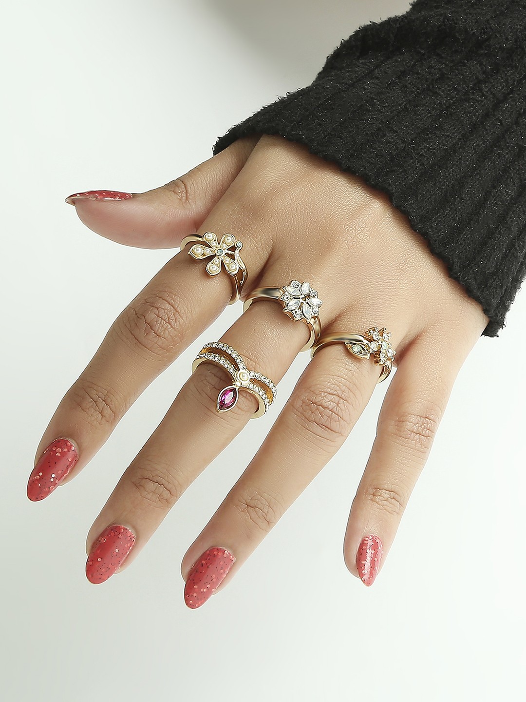 Set of 4 Gold toned floral crystal studded rings pack